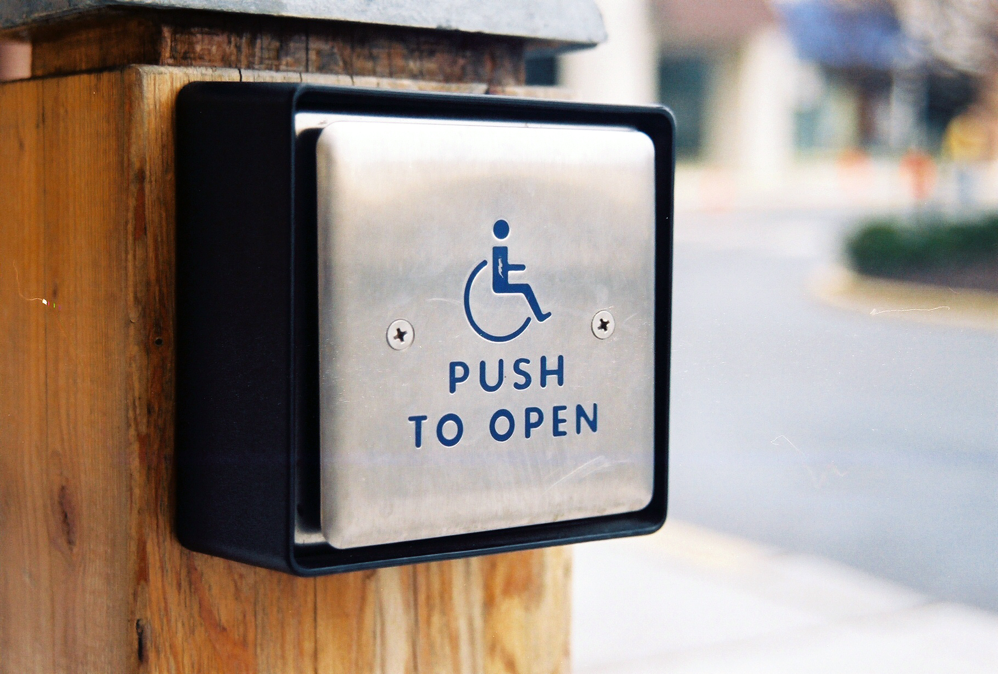 Disabled door entry button